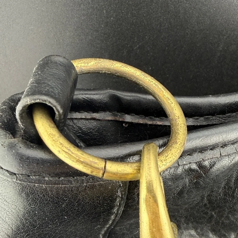 Tignanello Black Crossbody Bag with Gold Accents
